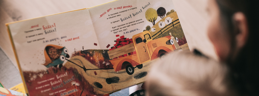 Mother reading to her child